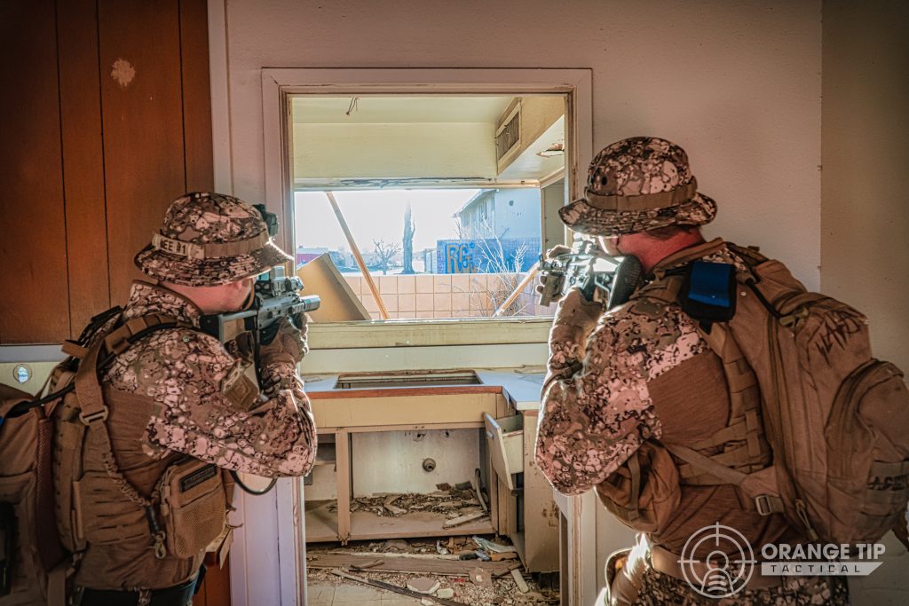 Airsoft players in an abandoned building